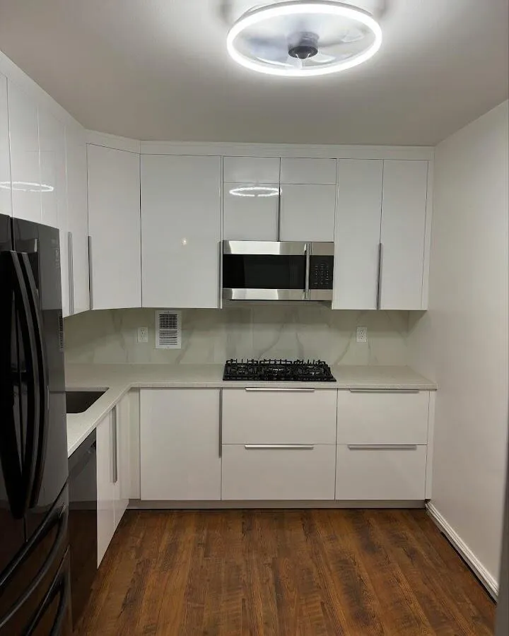 Renovated kitchen with quartz countertops in Plymouth